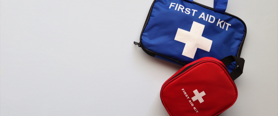 A large and small first aid kit 
